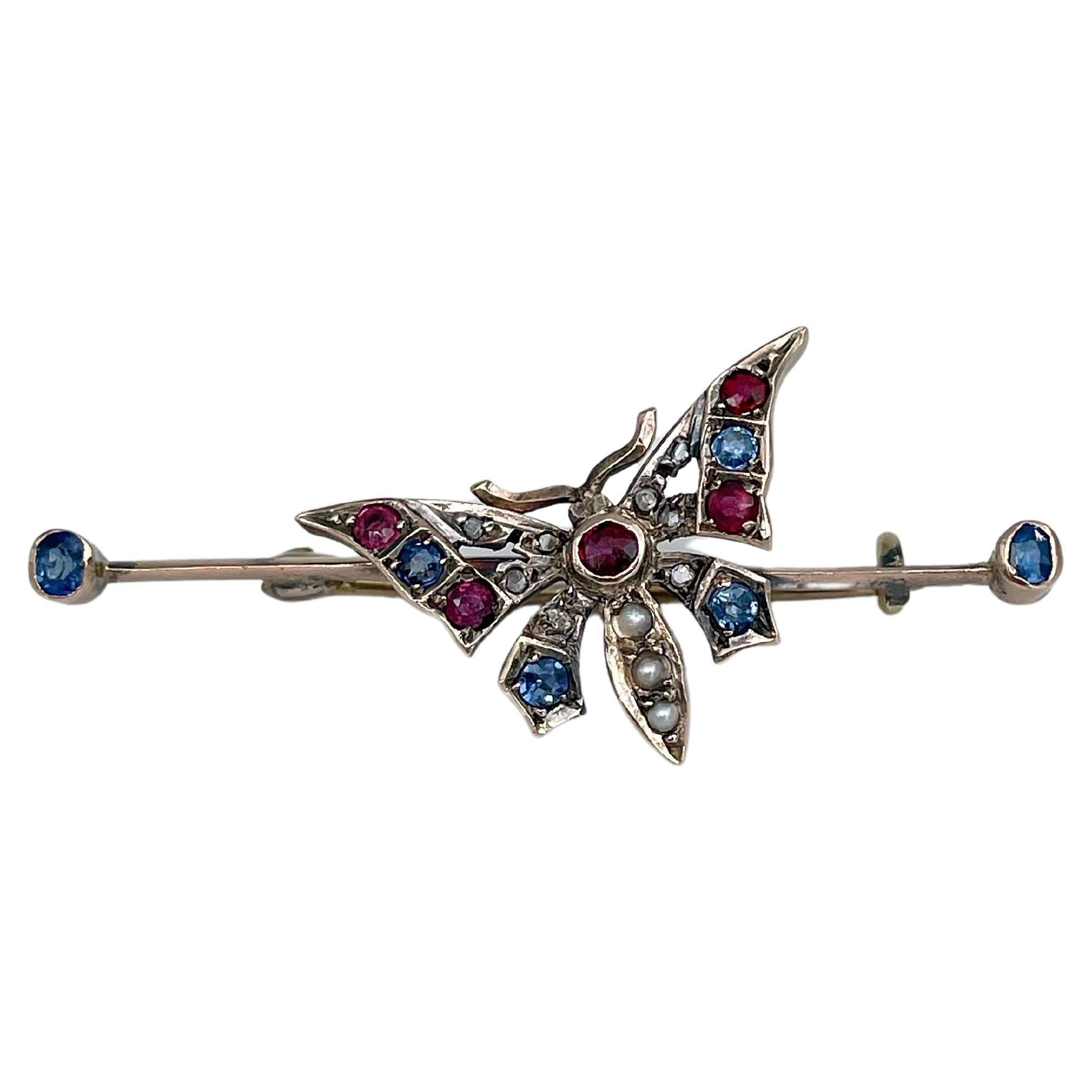 Victorian 18 Karat Gold Sapphire Ruby Pearl Old Cut Diamond Butterfly Bar Brooch For Sale