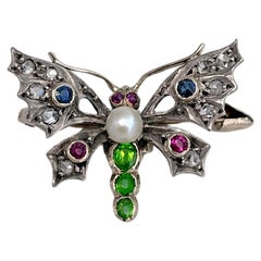 Broche papillon victorienne en or 18 carats, saphir, rubis, perle et diamant taille rose