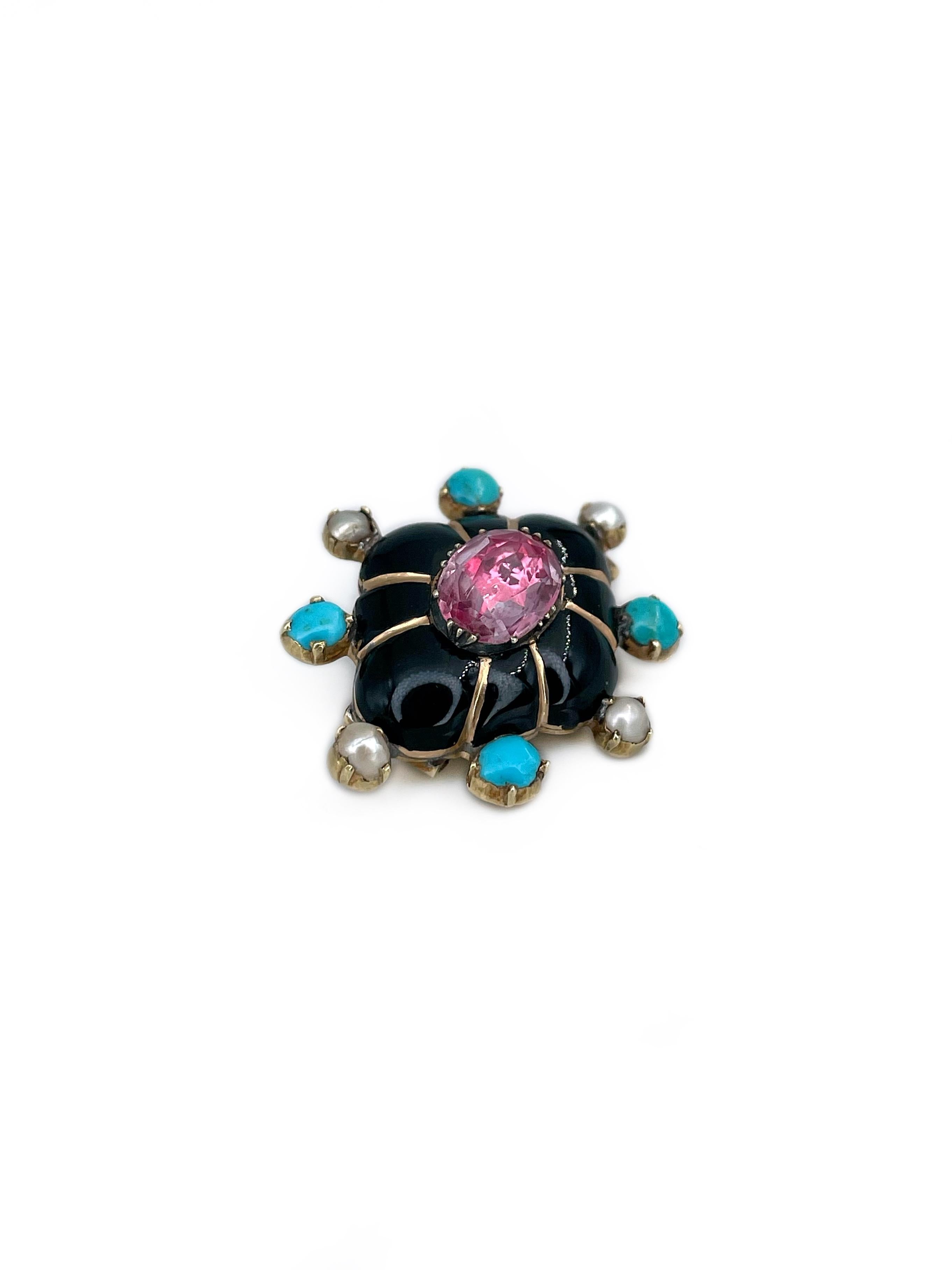 This is an amazing Victorian pin brooch crafted in 18K yellow gold. Circa 1870. 

The central stone is topaz (tested by the Assay Office). The piece is adorned with black enamel. The edges are encrusted with 4 turquoises and 4 cultured pearls. 