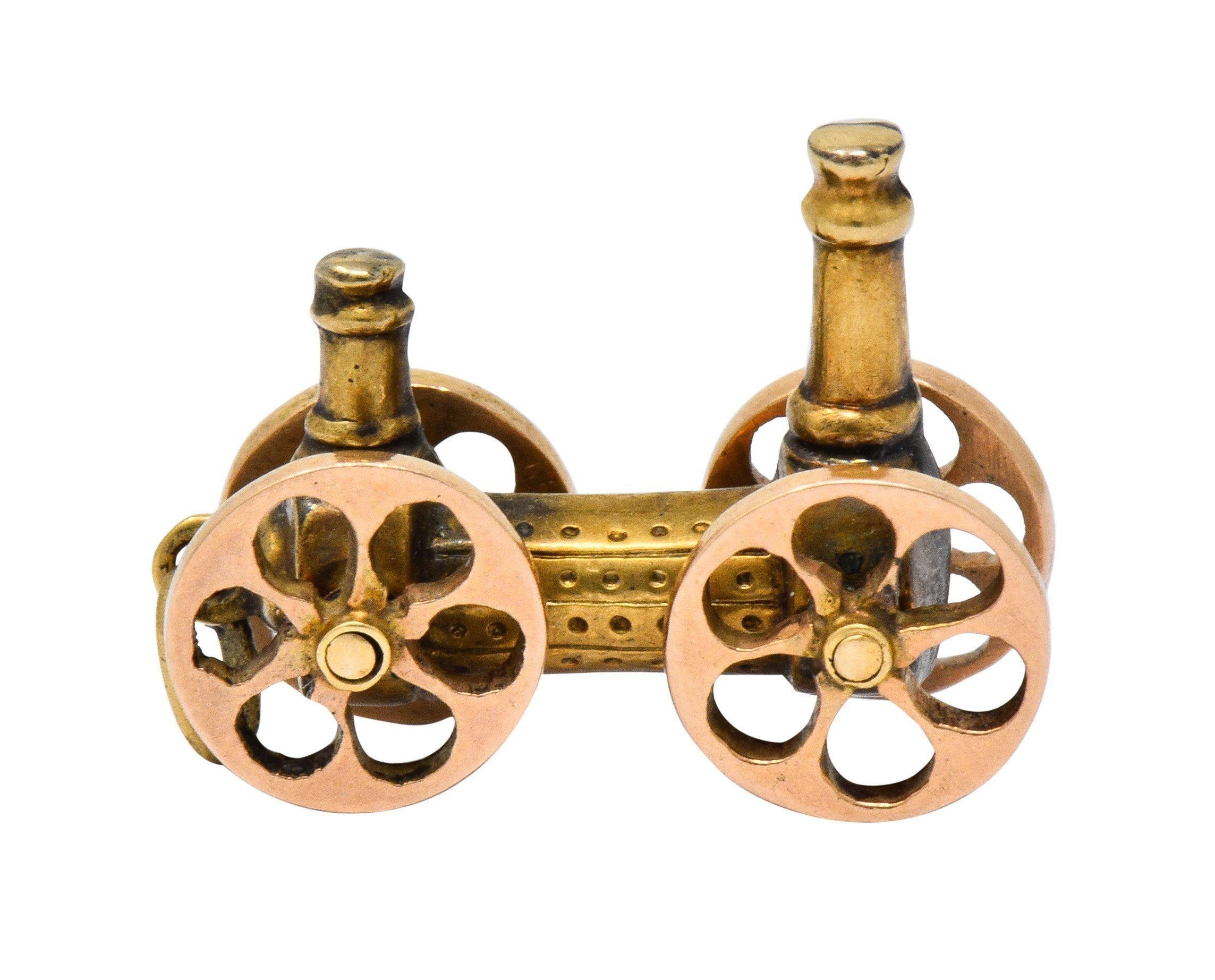 Designed as a yellow gold steam engine locomotive with grooved details
Accented by spinning rose gold wheels on yellow gold spokes
With grooved details throughout
Completed by jump ring bale
Tested as 18 karat gold
Circa: 1880s
Measures: 3/8 x 3/4