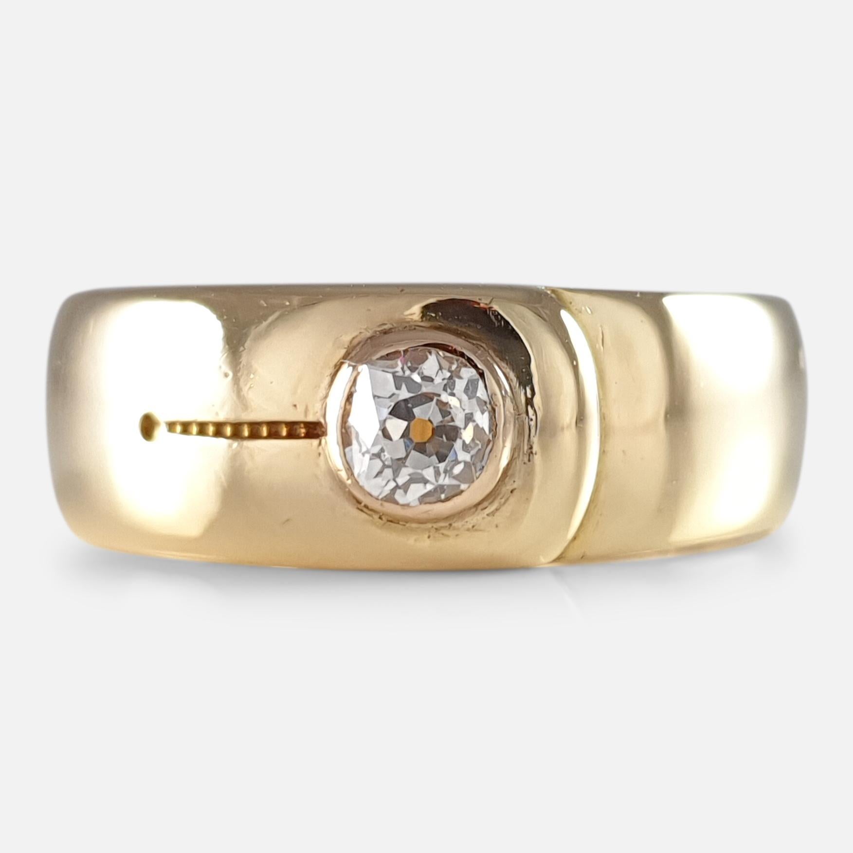 A Victorian 18 carat yellow gold and 0.30ct diamond buckle motif band ring.  

The ring is hallmarked with Chester assay office marks, stamped '18' to denote 18 karat (carat) gold, and the date stamp 'A' for 1884.

Date: - 1884.

Period: - Late 19th