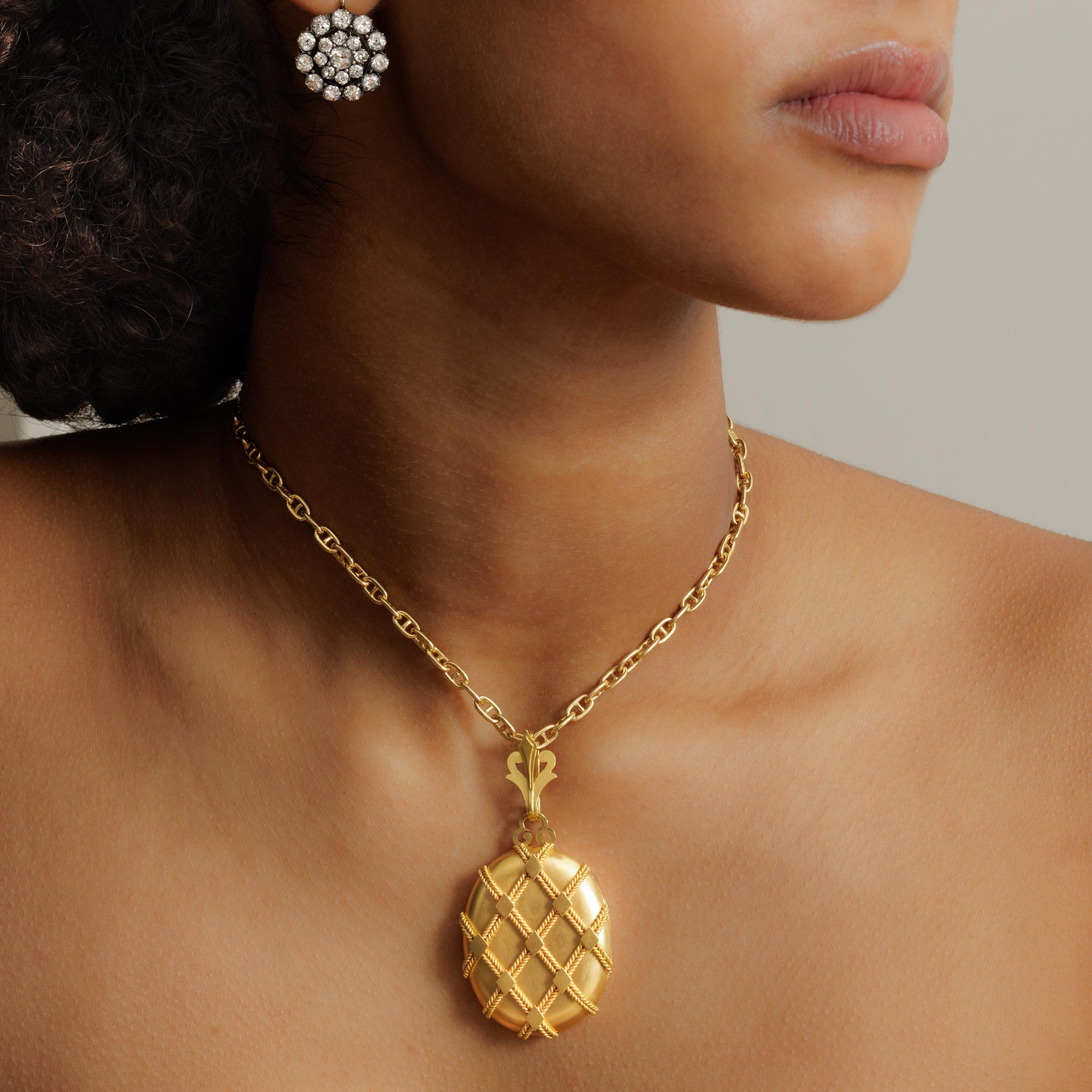 High Victorian 18 Karat Yellow Gold Large Cross Hatch Design Locket 
c.1880

L 67.32mm x W 33.21mm
28 grams
Locket only:
L 50.67mm x W 33.21mm

chain sold separately
heavy and substantial
