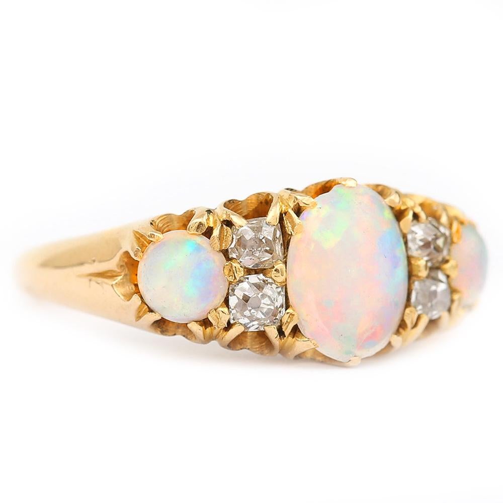 Late Victorian Victorian 18 Karat Gold Opal and Diamond Three Stone Gypsy Ring, circa 1890