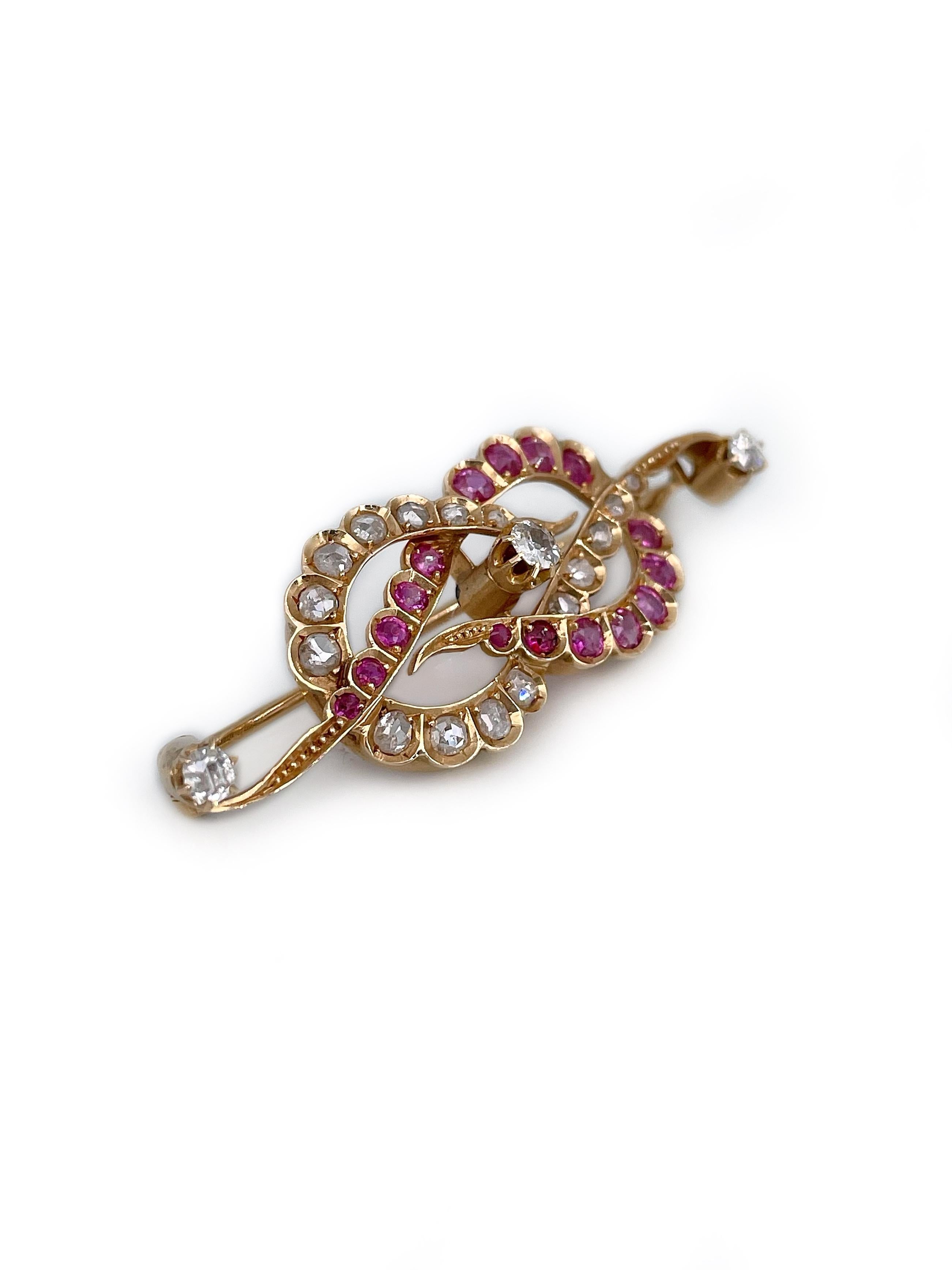 This is a Victorian knot pin brooch crafted in 14K gold. 

The piece features:
- 30 rubies (round/cushion cut, TW 0.80ct, stpR 6/4, VS-P1)
- 19 diamonds (rose/irregular cut, TW 0.55ct, RW-W, VS-P1)

Weight: 5.05g
Size: 4.5x1.5cm

———

If you have