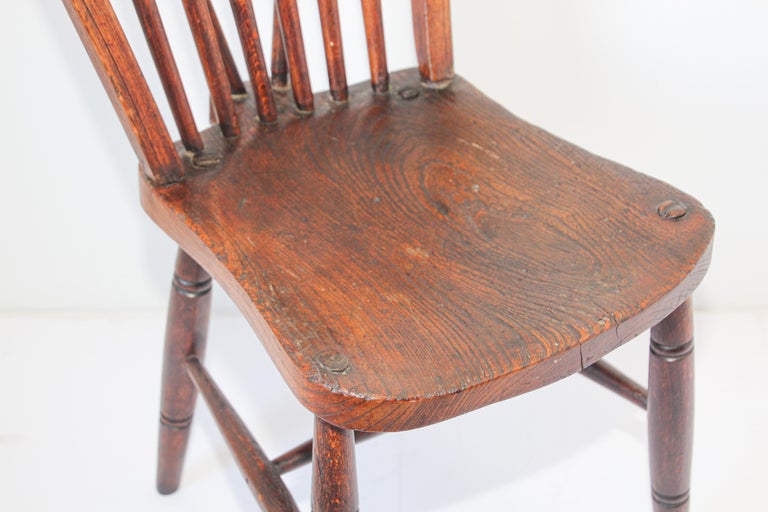 Rare fully stamped Victorian 1840 hoop back Windsor chair High Wycombe.
Beautiful patina, wonderful workmanship and remarkably comfortable. 
Very sturdy. This chair alone can provide wonderful atmosphere in a room.
Early Victorian elm Windsor
