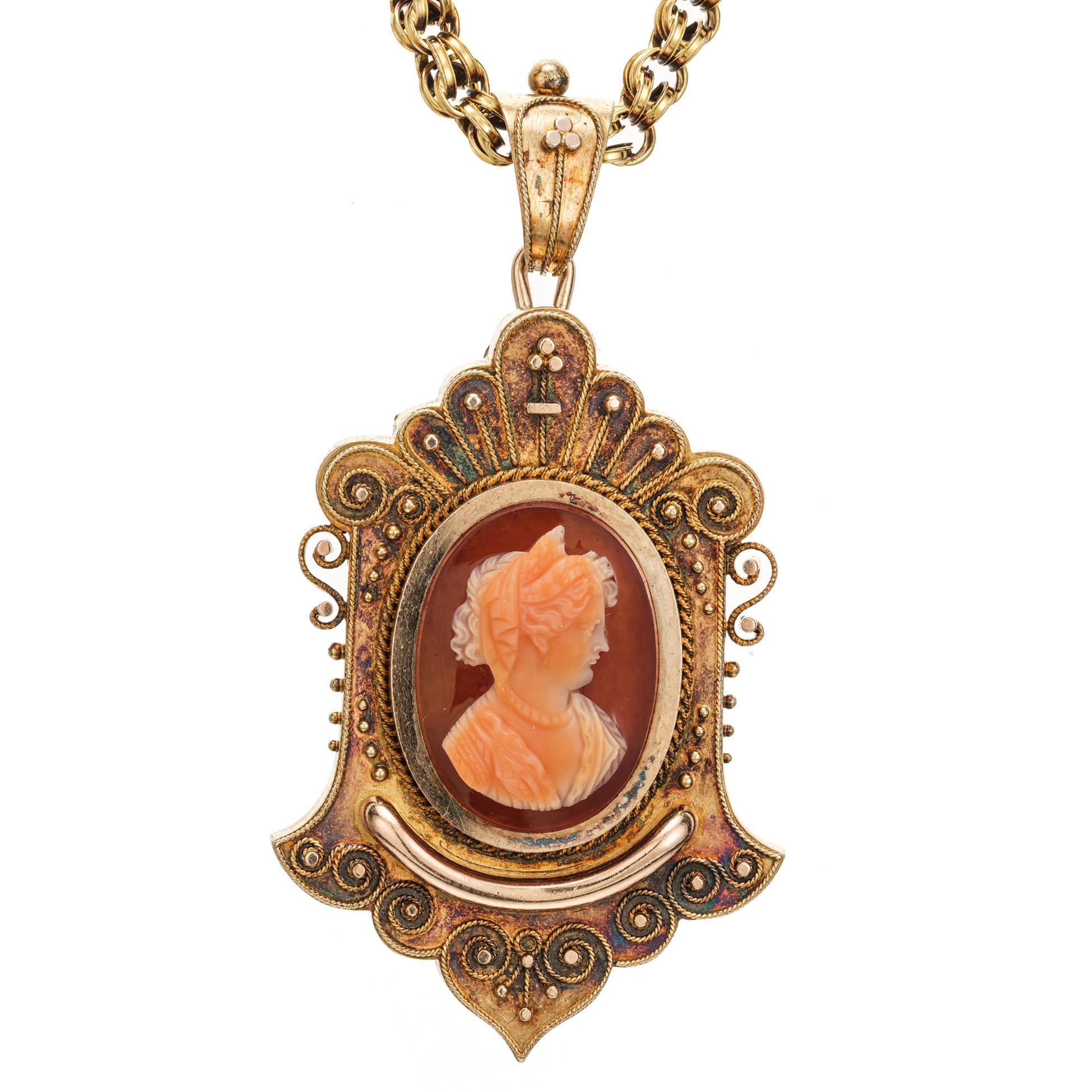Original handmade Victorian carnelian carved cameo brooch pendant with natural patina and delicate granulation work. The 22 inch chain is also handmade and original. The back of the brooch has a glass frame for a picture. The glass is original to