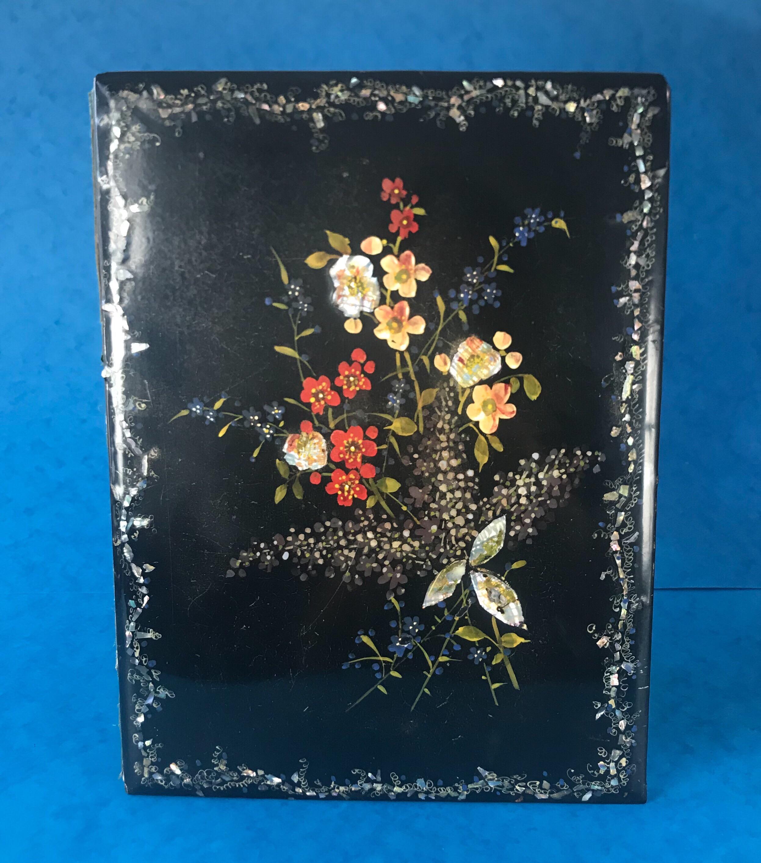 A rare Victorian 1860 beautifully hand painted Papier-mâché photo album of the Lake District, in superb condition with a beautiful hand painted green, blue red and yellow array of flowers with mother of pearl inlay to the front and photos of