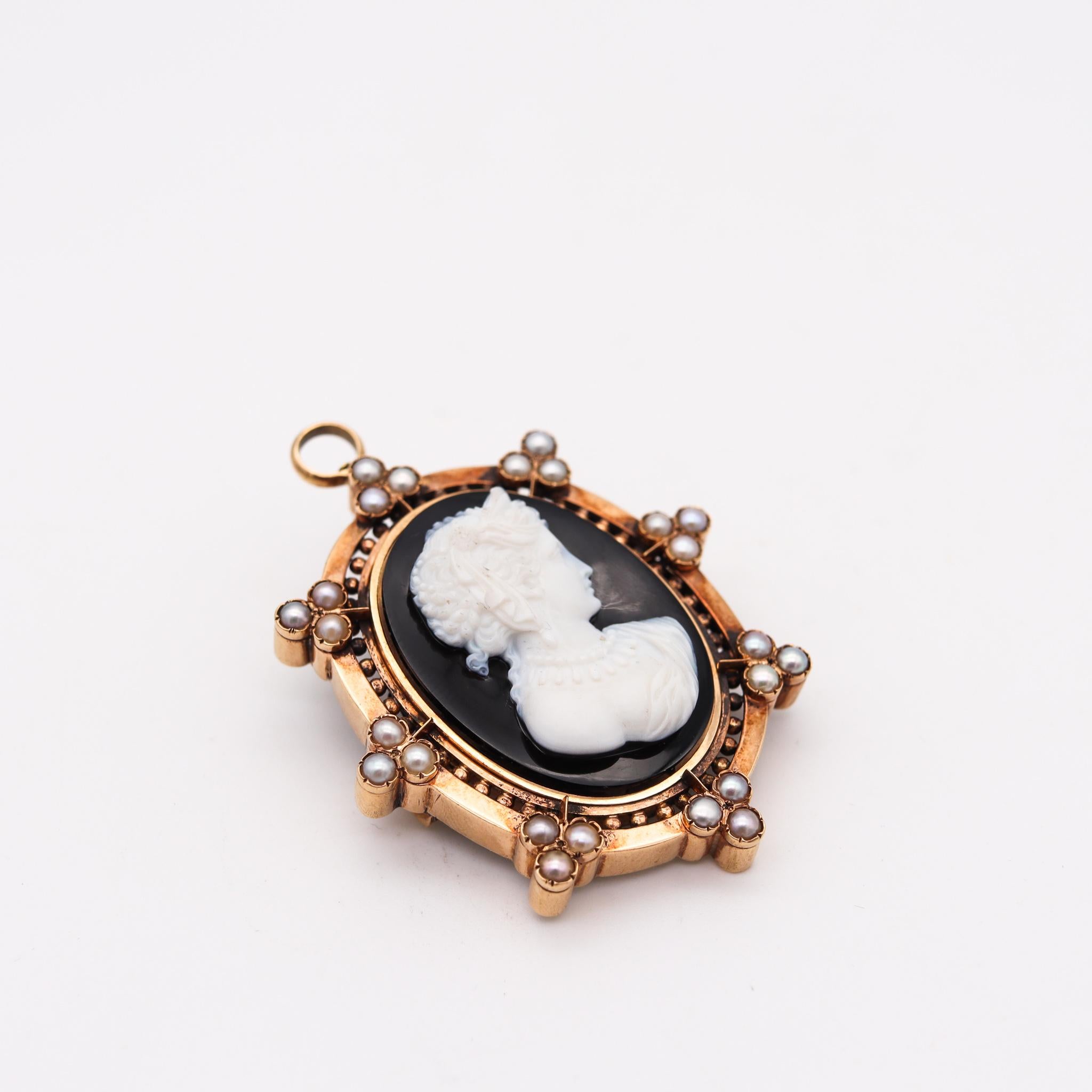 Victorian convertible pendant brooch.

A beautiful bold piece, created in England during the Victorian Era (1837-1901), circa 1870. This convertible pendant-brooch has been crafted in the Etruscan revival style in solid yellow gold of 15 karats.