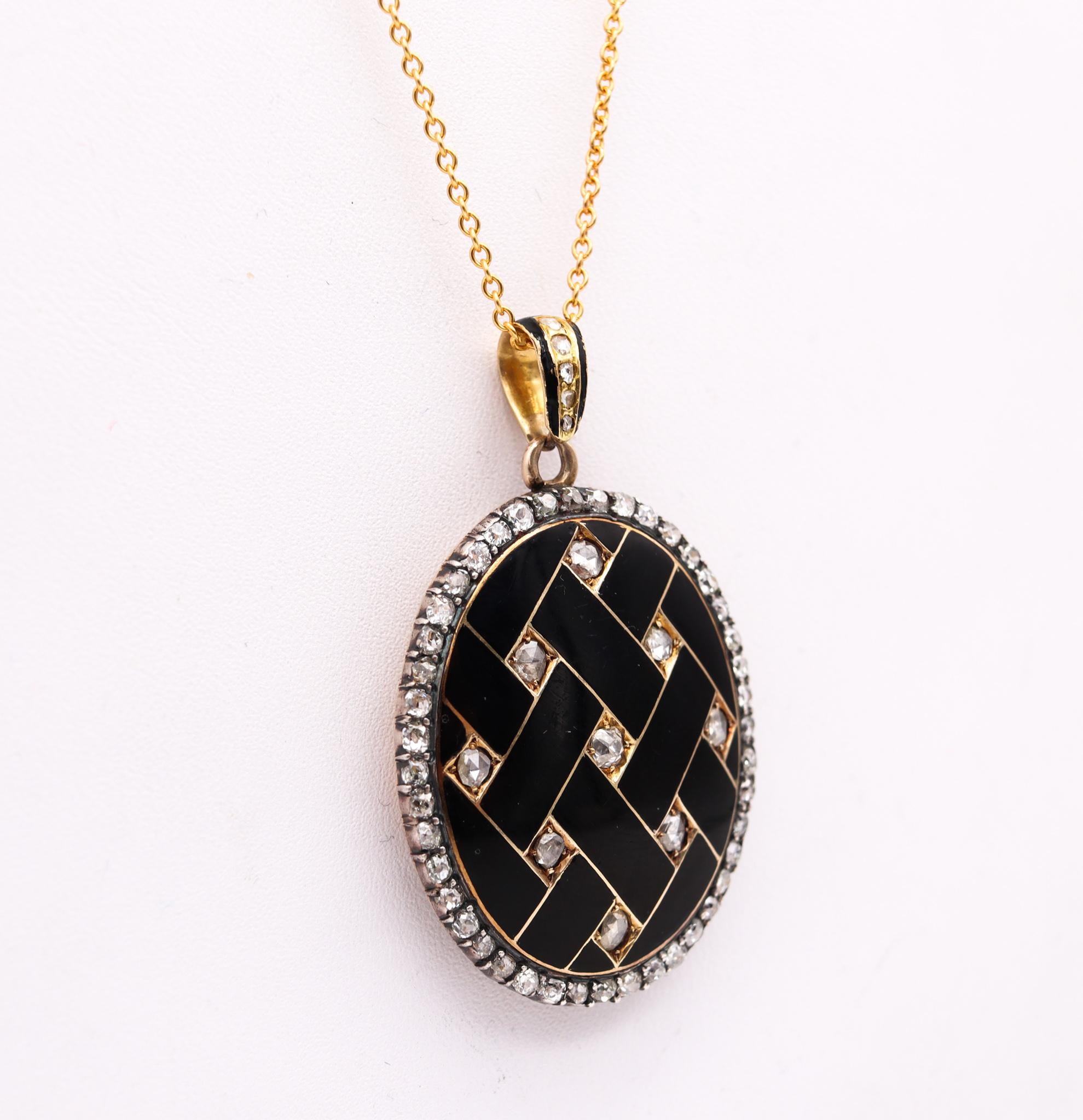 Very rare pendant locket from the Victorian Era.

Exceptional piece, created in England during the Victorian period, back in the 1870. This important pendant locket has been made up with an extremely unusual geometric pattern of a lattice. It was