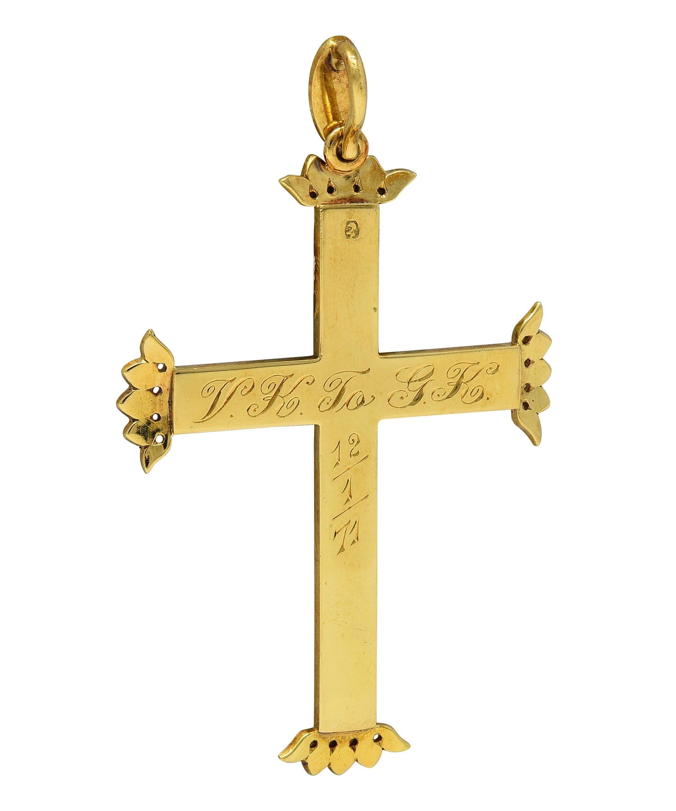 Designed as a cross shaped form suspending from a jump ring bale
Bead set throughout with natural button pearls
Ranging in size from 3.5 to 5.5 mm round
White in body color with strong iridescence
Accented by flourishing crown motif terminals
Bead