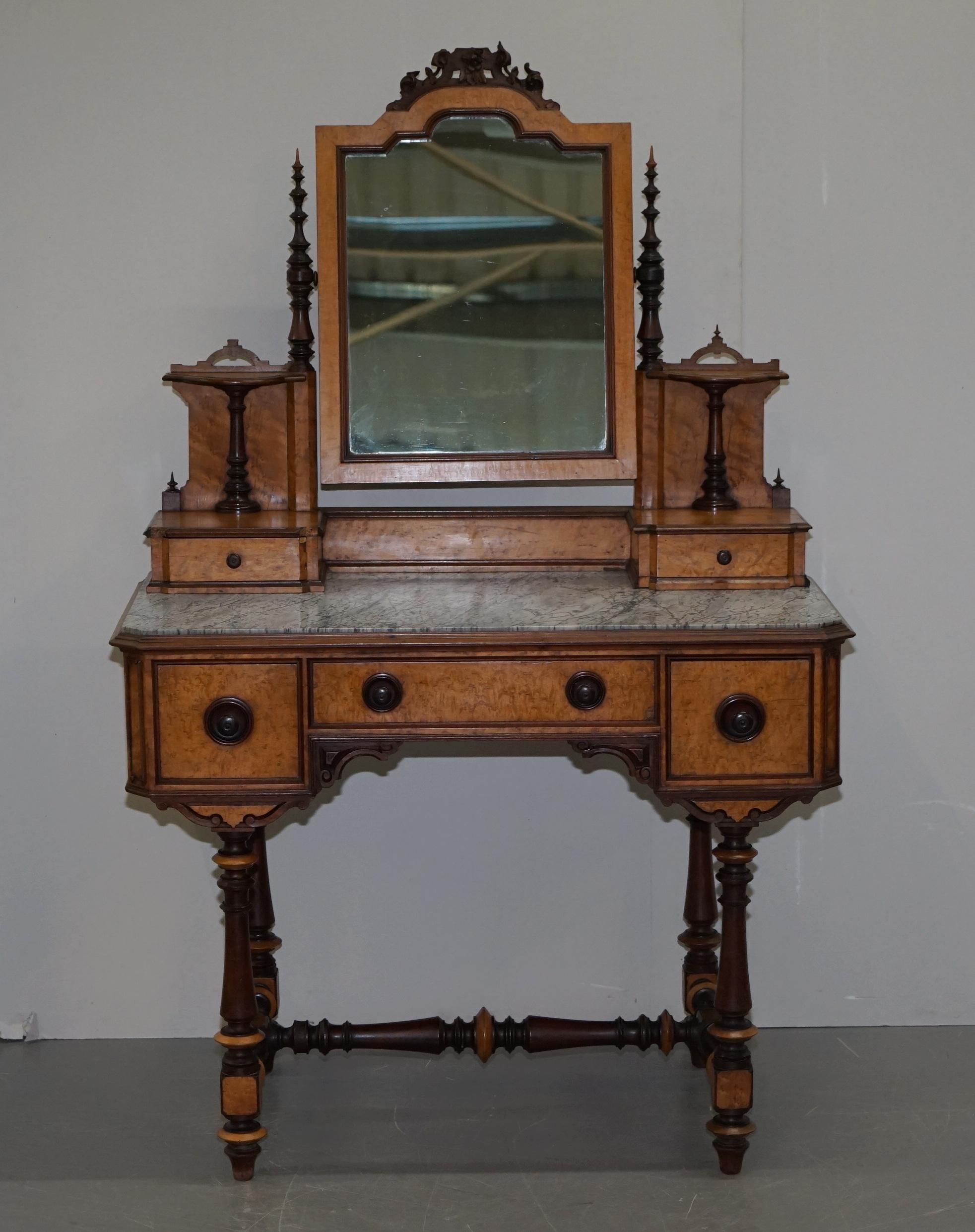 We are delighted to offer for sale this sublime 19th century Victorian continental burr satinwood dressing table with Italian marble top

A quintessentially Classic piece, it feels eastern European, most likely Venetian, the frame is exquisite