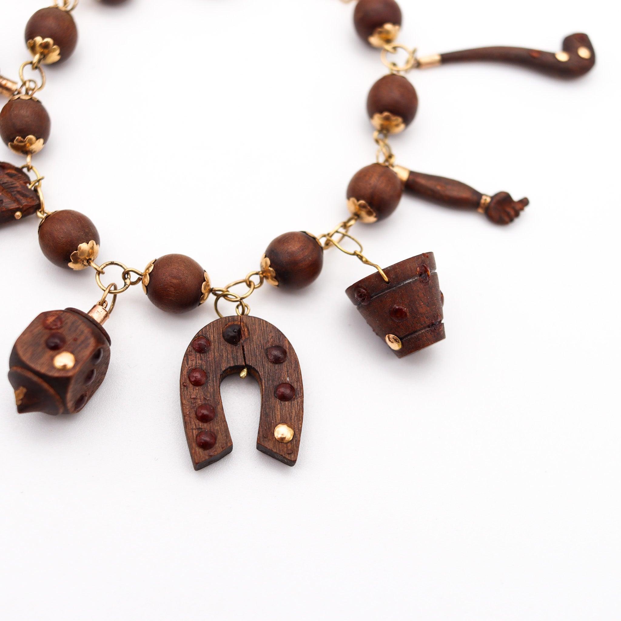 VICTORIAN 1880 Exceptional Charms Bracelet In Wood Mounted In 18Kt Yellow Gold In Excellent Condition For Sale In Miami, FL