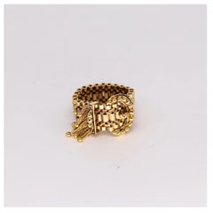 Victorian 1880 Flexible Buckle Ring with Fringes in 14 Kt Yellow Gold and Enamel