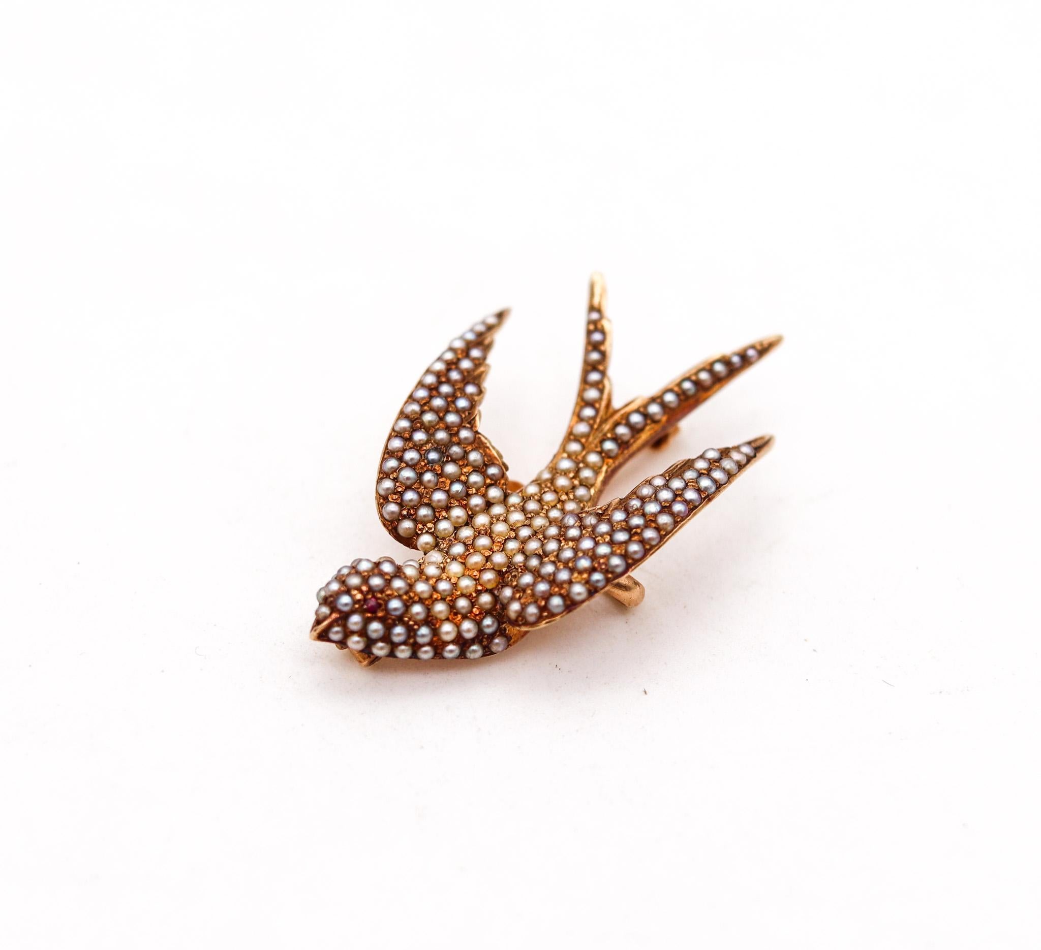 Flying dove brooch with pearls.

Very rare piece, created in England during the high Victorian era (1837-1901), back in the 1880. This fabulous brooch has been carefully crafted in the shape of a flying dove in solid yellow gold of 14 karats with