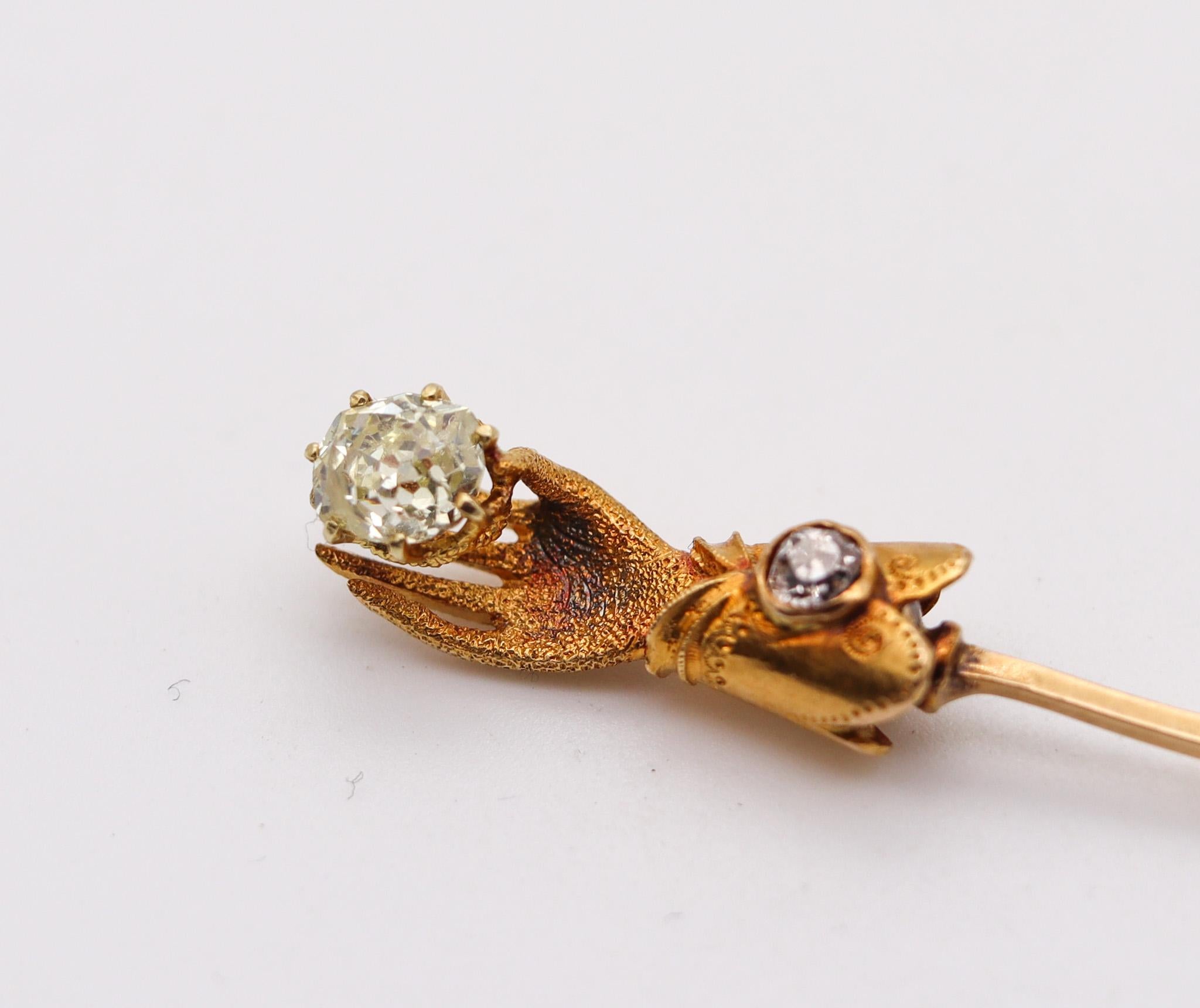 Victorian hand glove stick pin.

Very interesting and rare sick pin, created in England during the Victorian period, back in the 1880. It was crafted in the shape of a hand glove in solid yellow gold of 18 karats whit is holding a rose cut diamond.