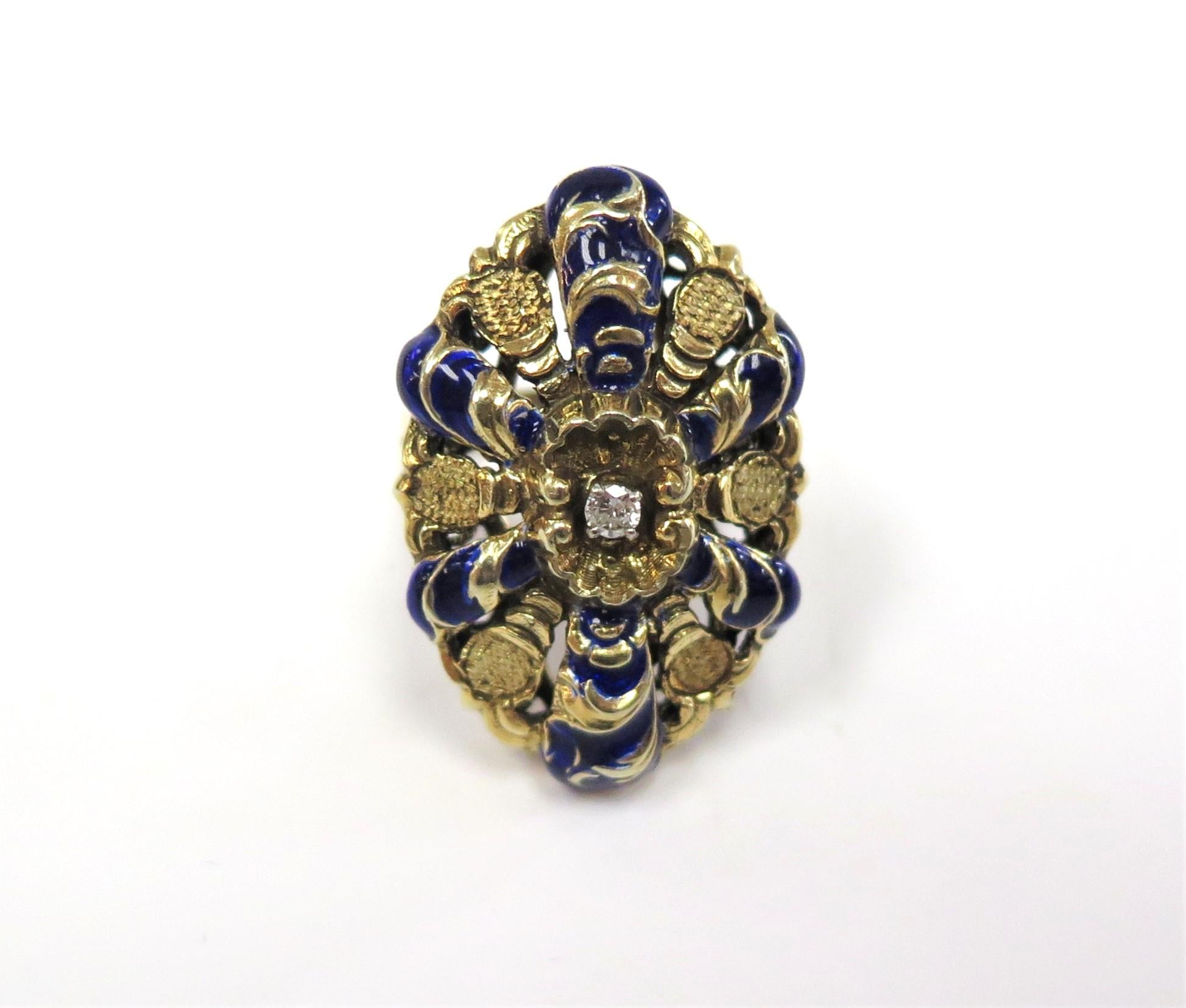 This is a stunningly regal and elegant antique Victorian ring whose blue enamel and 14 karat yellow gold create an utterly stunning color pop.

Circa 1880
Center Round Diamond: 0.07 Carat Clarity: VS/SI Color: G-H
size 7 - We can size it for you
