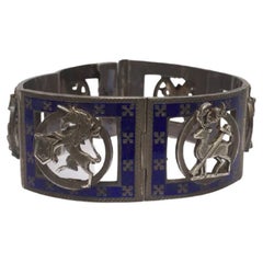 Brazalete escocés victoriano de plata con panel de esmalte de la década de 1880