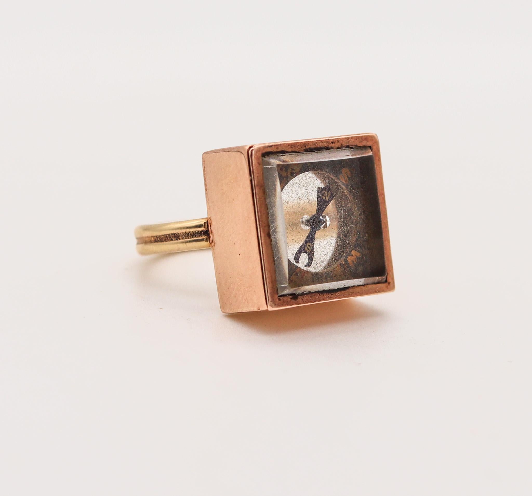 Antique ring with a mechanical functional compass.

Fabulous ring with a compass, created in America during the late Victorian era, back in the 1890. This extraordinary and very rare ring has been crafted in a squared shape in solid rose gold of 14