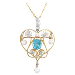 Colgante o broche victoriano de 1890 de diamantes, aguamarinas, perlas y oro amarillo