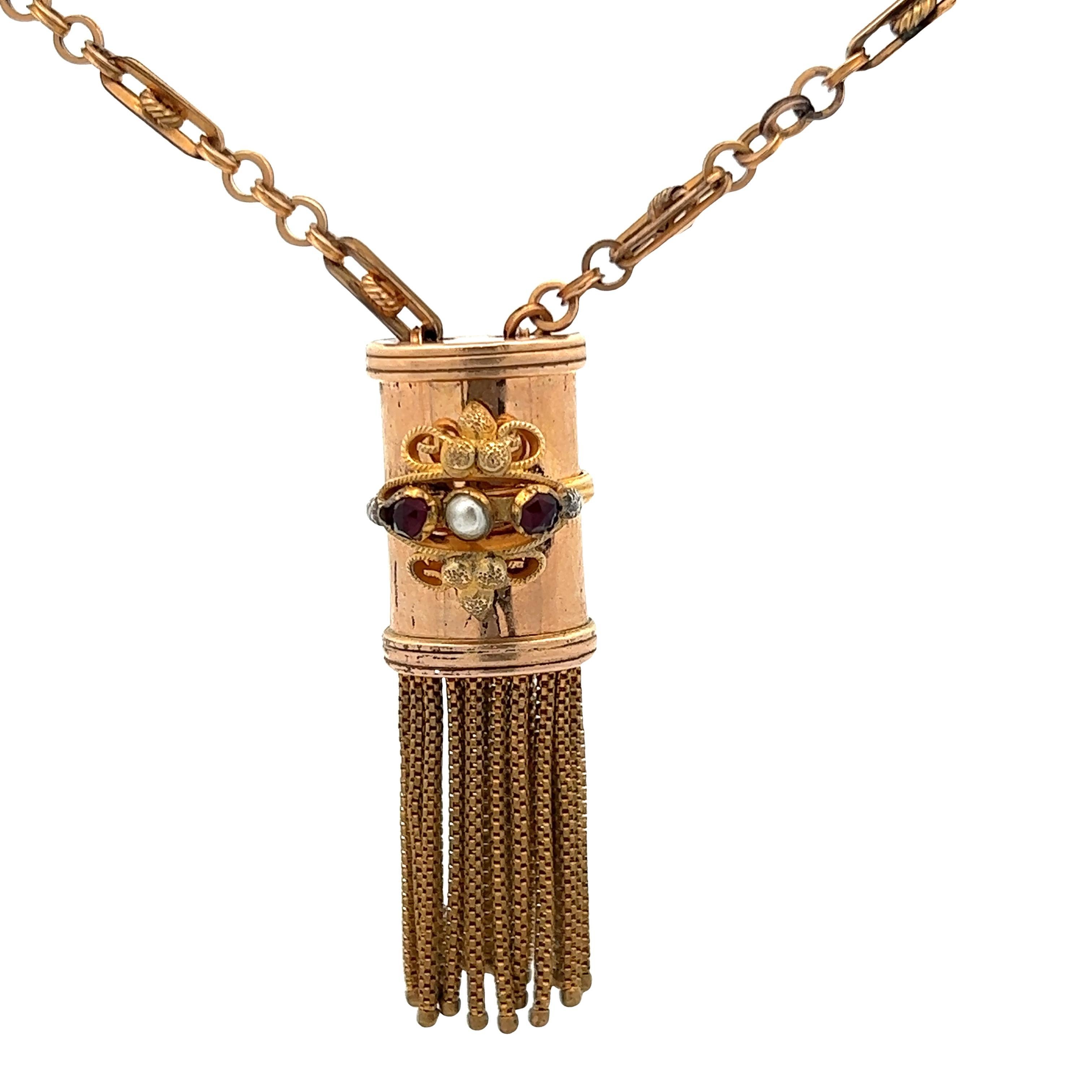 This gorgeous gold filled tassel necklace from the 1890s Victorian era is very special. The circle and bar chain is very unique in todays world as it is less common for todays time period, unlike 1890 Victorian. The pendant features two rose cut