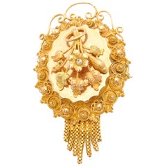 Antiguo broche de oro de 14 quilates con perla de Oriente y borla de Cannetille
