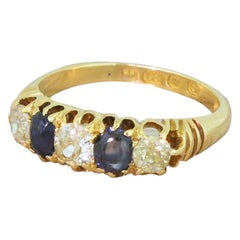 Victorian 1893 Fancy Yellow Old Cut Diamond and Sapphire Five-Stone Ring