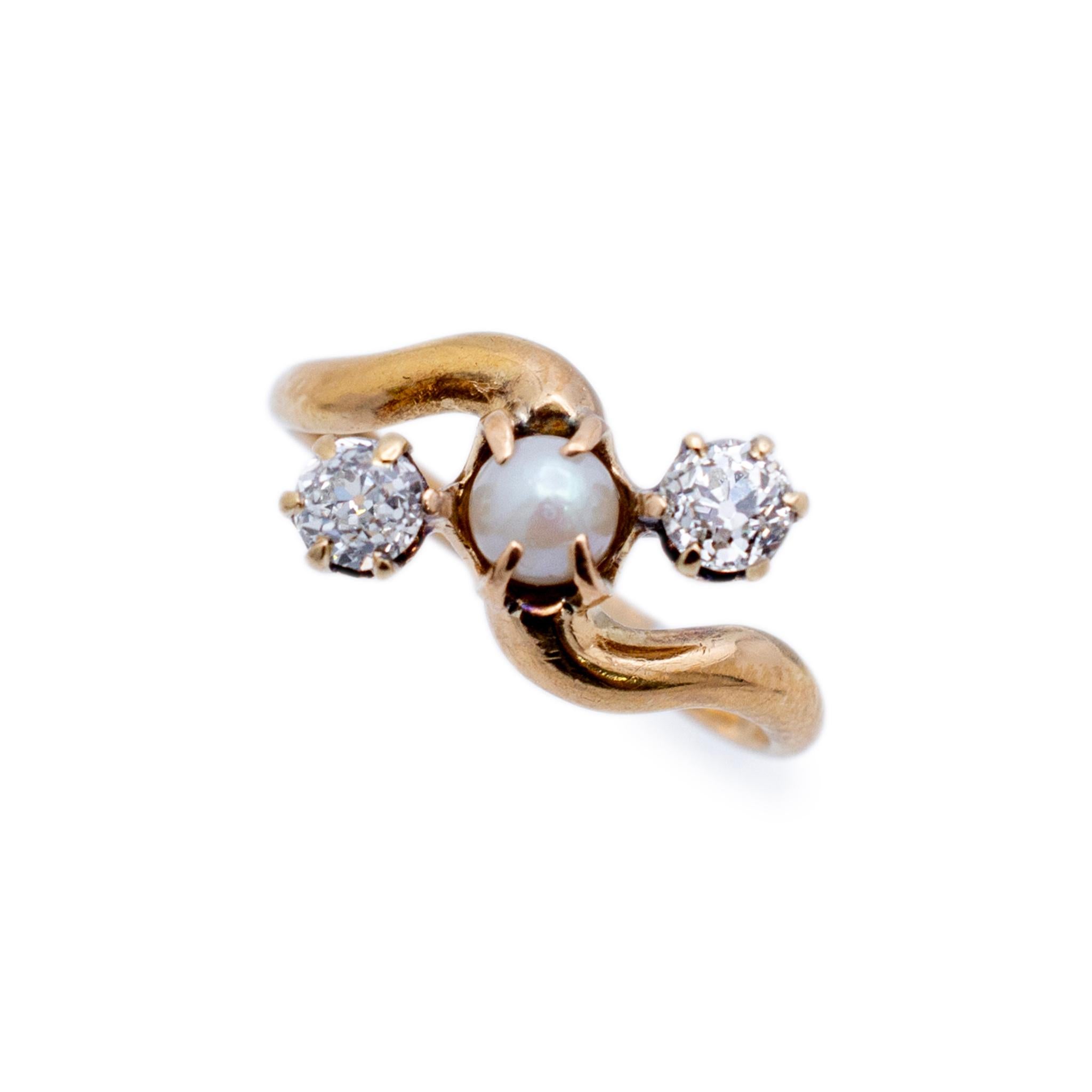 Gender: Ladies

Metal Type: 18K Yellow Gold

Ring Size: 5.5

Head measurements:  9.50mm in width

Shank maximum width:  2.45mm

Weight: 2.40 grams

18K yellow gold three-across diamond and pearl antique cocktail ring with a half round shank. The