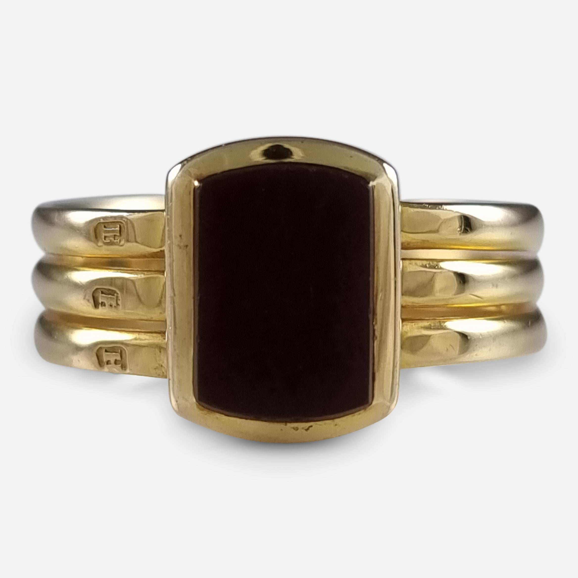 A Victorian 18ct yellow gold rectangular carnelian oval triple shank signet ring.

The ring is hallmarked with London assay office marks, date letter 'H' for 1883, and stamped '18' to denote 18 carat gold.

Period: - Late 19th century.

Date: -