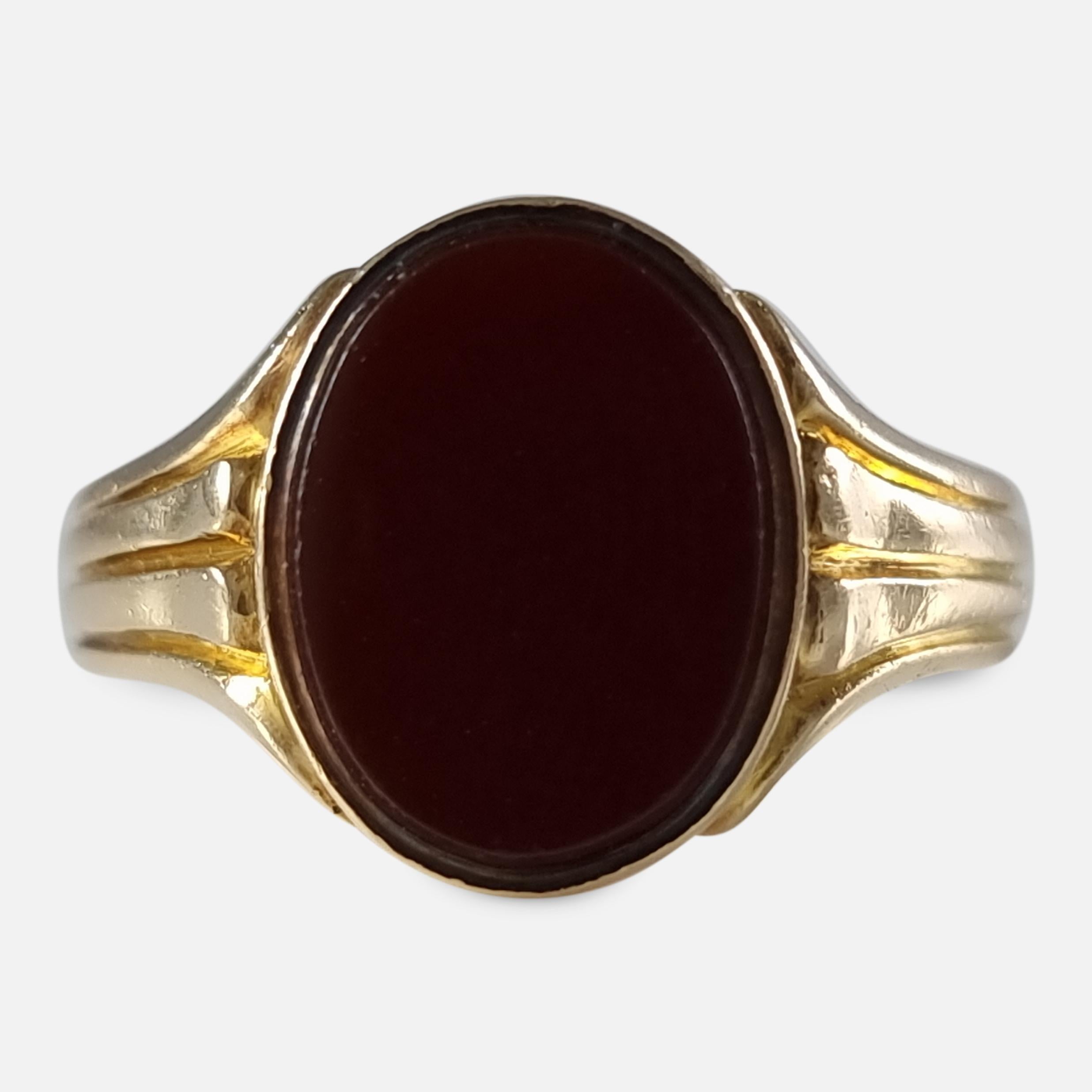 A Victorian 18ct yellow gold carnelian signet ring. The signet ring is set with an oval carnelian, leading to a reeded shank.

The ring is hallmarked with London assay office marks, the date letter 