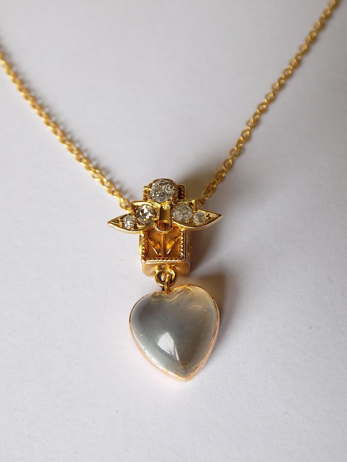 A Gorgeous Victorian c.1890 18 Carat Gold, old cut and Moonstone heart pendant. The pendant complete with a brand new 16