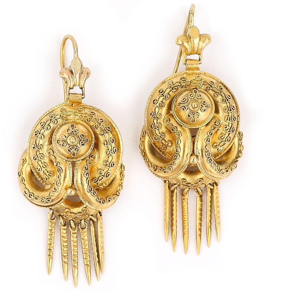 An impressive Victorian 18ct gold Etruscan Revival demi-parure dating from later part of the 19th century. This stunning antique suite comprising: a pair of earrings, each designed in the Etruscan revival style. Designed as interconnected hoops