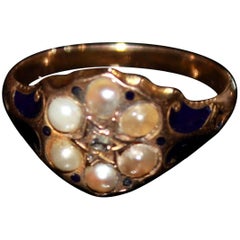 Victorian 18ct gold ring set with a rose cut diamond, pearls & blue enamelling
