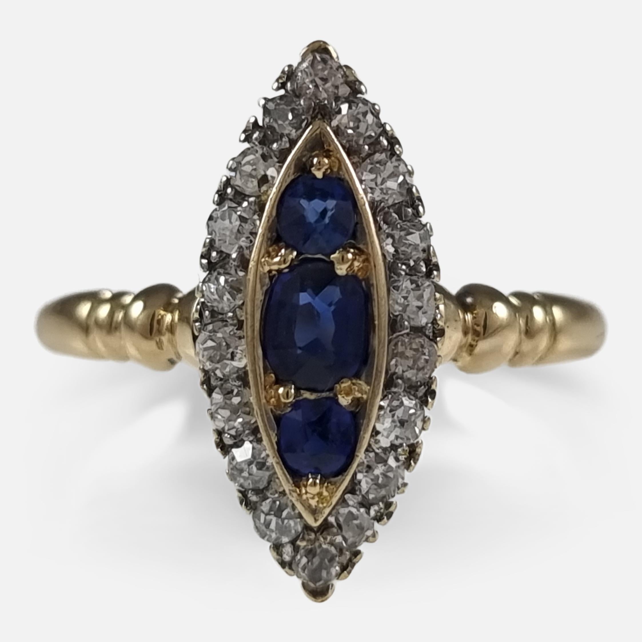 A late Victorian 18ct yellow gold sapphire and diamond Navette (Marquise) cluster ring. The ring is set with 3 sapphires surrounded by a further 18 diamonds.

The ring is stamped '18ct' to denote 18ct gold fineness.

Period: - Late 19th