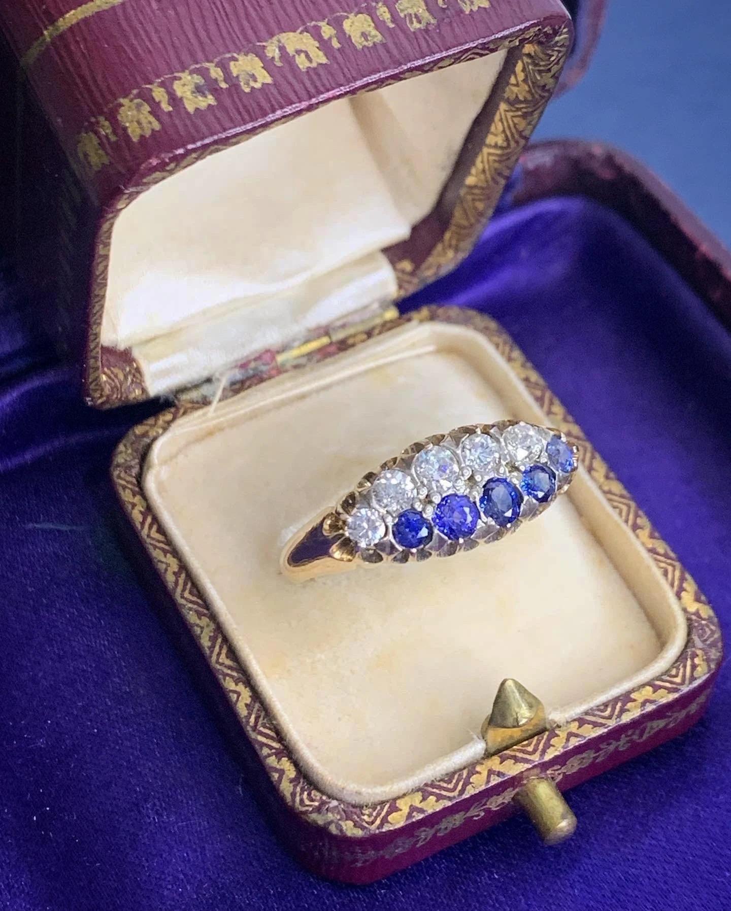 Victorian Sapphire & Diamond Boat Ring 

18ct Gold Stamped 

Two row- sapphire & diamond boat shaped ring

Dazzling blue sapphires accompanied by beautiful bright old cut diamonds, set in white gold  

Circa 1880 

UK Size P

US Size 7 1/2 

Can be