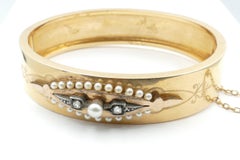 Victorian 18 Carat Rose/Yellow Gold Diamond and Pearl Hinged Bangle