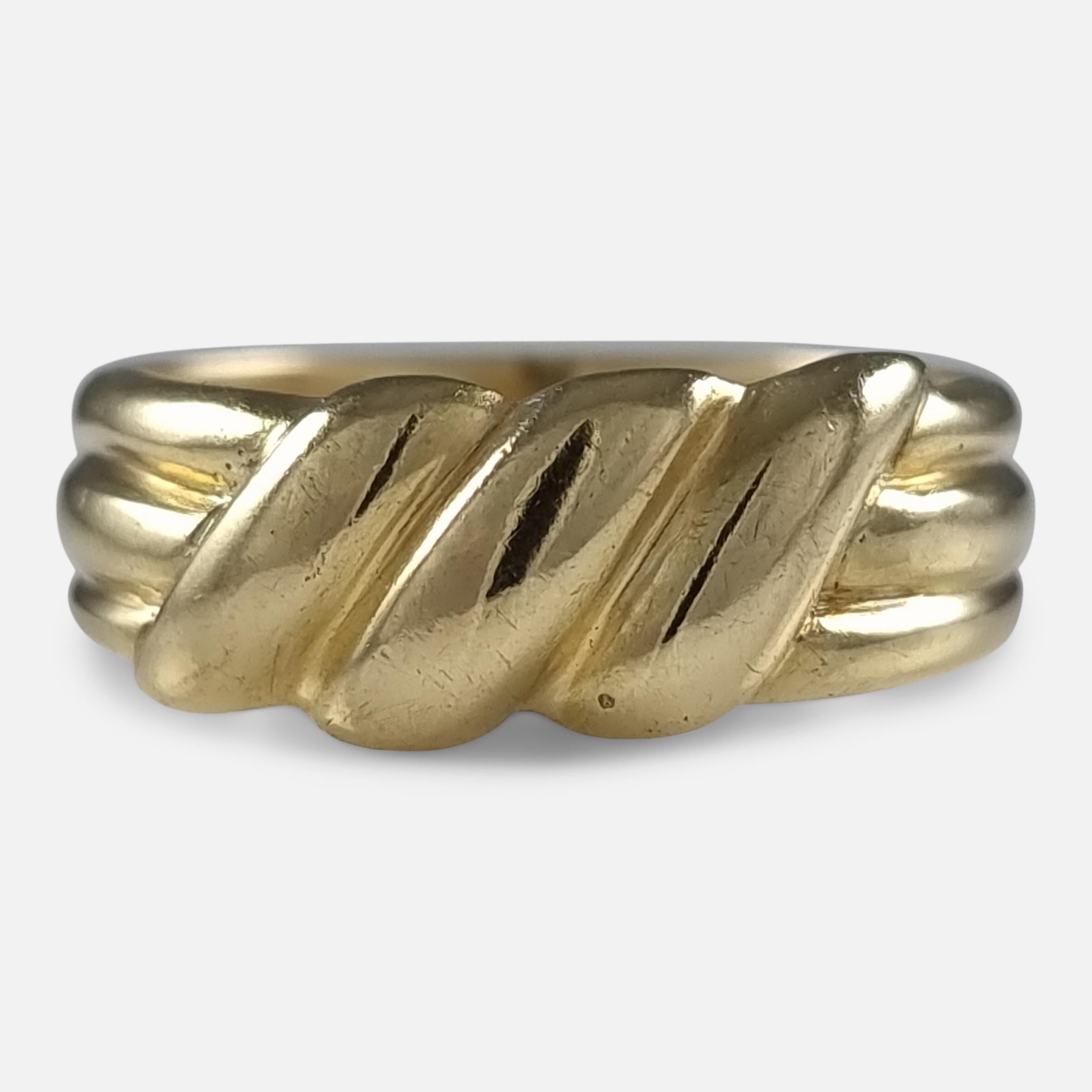 A Victorian 18ct yellow gold 'Keeper' ring from 1900, hallmarked with Birmingham assay office marks. Traditionally worn to keep another ring secure on the finger.

• Assay: .750 Gold (18ct)
• Measurement: UK ring size Q 1/2 (leading edge), US ring
