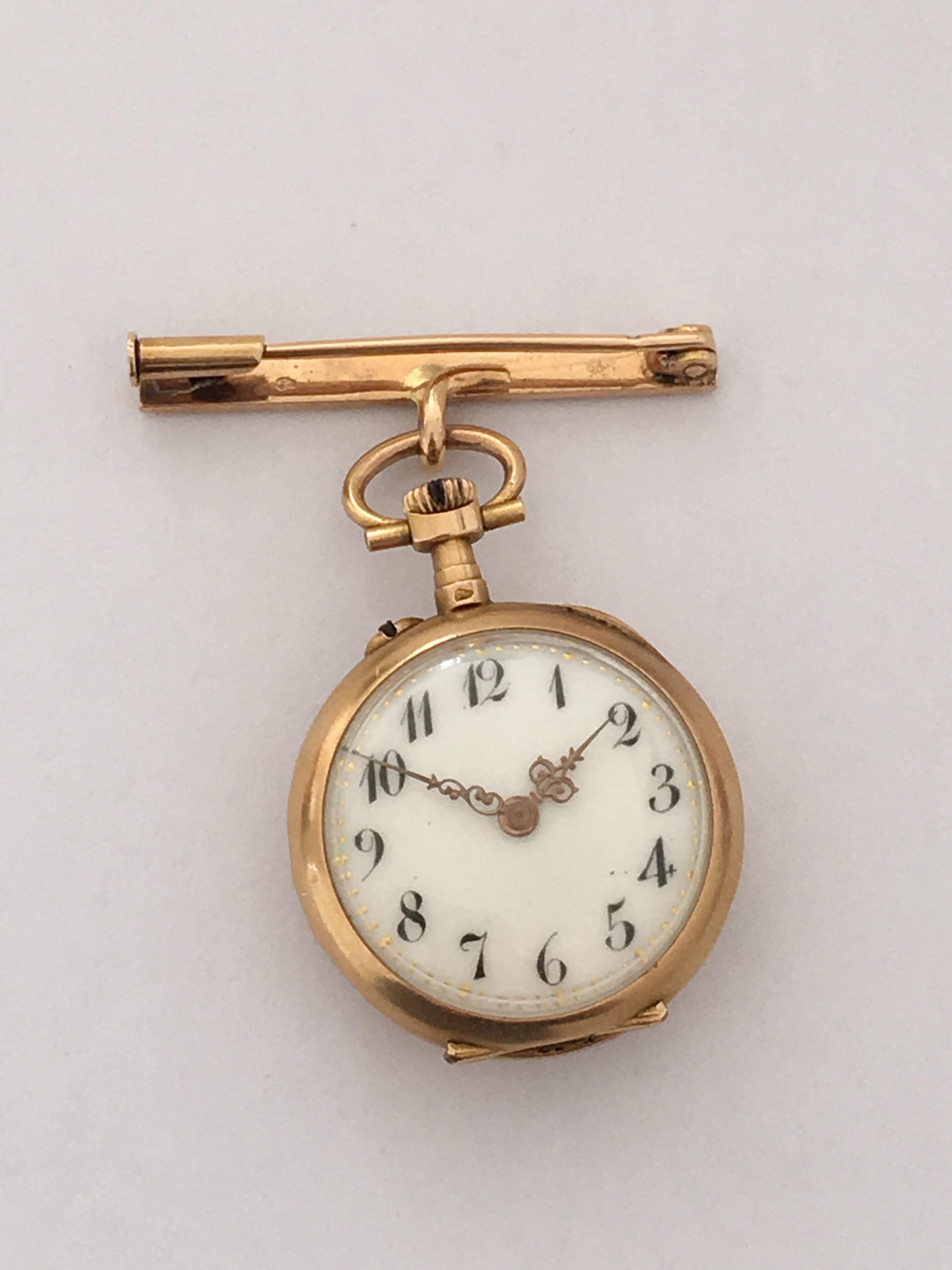 This beautiful 22mm diameter gold / diamonds brooch fob watch is in good working used condition. One piece of the diamond stone is missing and also there are some visible dents on the side of the watch as shown on the photos. And the winder gold