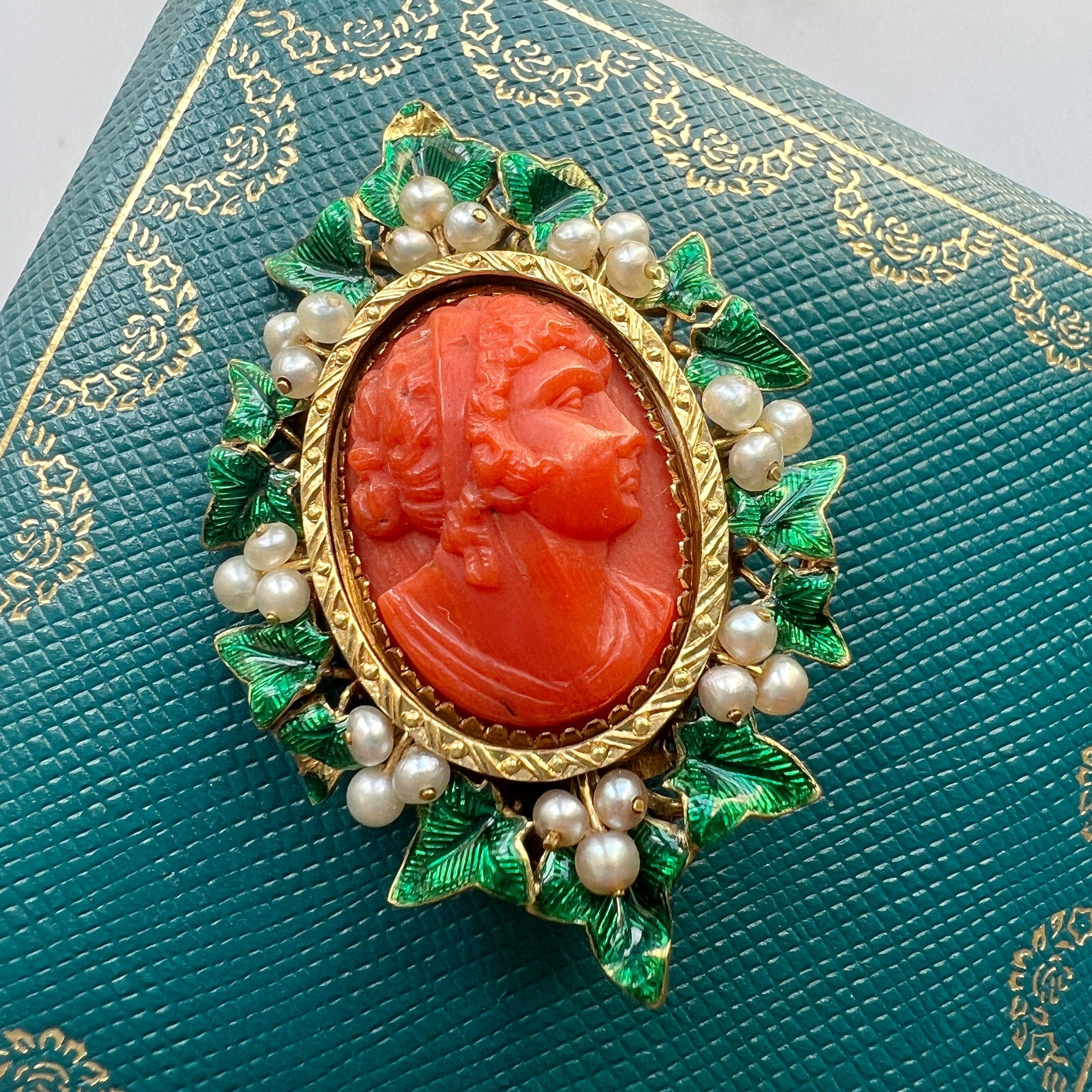For sale a rare red coral cameo brooch mounted in 18K yellow gold, crafted during the Victorian era, circa 1850s. This exquisite brooch is a true testament to the artistry of a bygone era, boasting a design that captivates the heart and