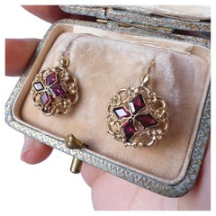 Victorian 18K gold flat cut garnet flower earrings