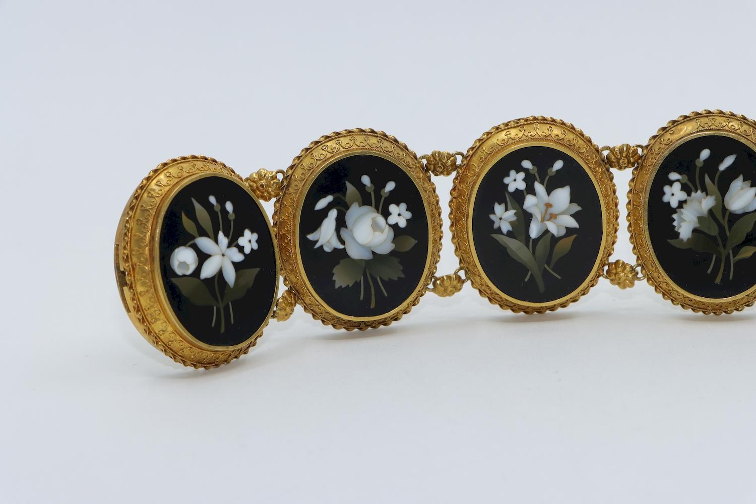 Victorian 18K Gold Pietra Dura Bracelet

Approximate Dimensions:
20 cm (Unclasped Length) 
3.8 cm (Width) 
46.8 grams in weight.