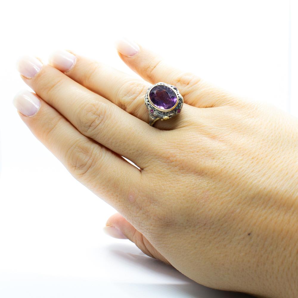 Composition: 18k gold & Silver
Period: Victorian (1836-1901)
•	4 natural square cut rubies 0.20ctw
•	1 natural oval cut amethyst 5ctw
Ring size: 8 ½ 
Ring face measure: 18mm by 16mm
Rise above finger: 8mm
Total weight: 5.7 grams – 3.7dwt
