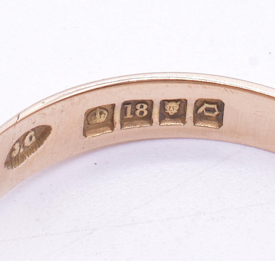 Hallmarked for 1891 and adorned with plaited gold work, our ring looks equally beautiful when viewed from inside. These rings were also known as keeper rings,  a snug fitting ring worn with another larger ring to keep the larger ring from sliding