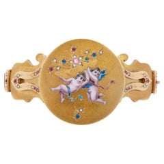 Bracelet victorien en rubis, saphir, émeraude et perle, émaillé d'un chérubin, 18k