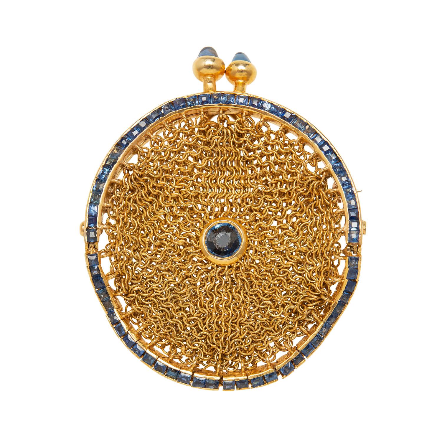 An absolutely gorgeous and unique chatelaine purse from the Victorian (ca1880) era! Crafted in 18k yellow gold, this ornate coin purse features a beautiful frame that holds a hand wrought mesh bag. The frame displays an incredible line of calibrated