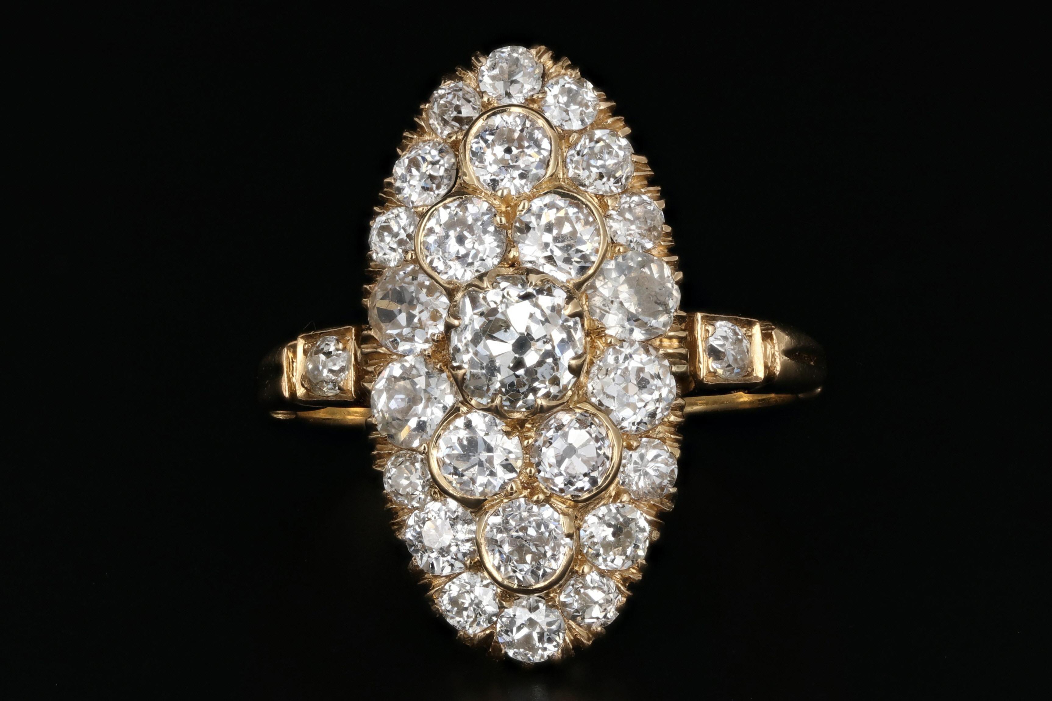 Era: Victorian

Composition: 18K Yellow Gold

Primary Stone: Old Mine Cut Diamond

Stone Carat Weight: .53 Carats

Color/ Clarity: J/SI2

Accent Stone: Old European Cut Diamonds

Accent Stone Carat Weight: 1.80 Carats

Color/ Clarity: I/J,