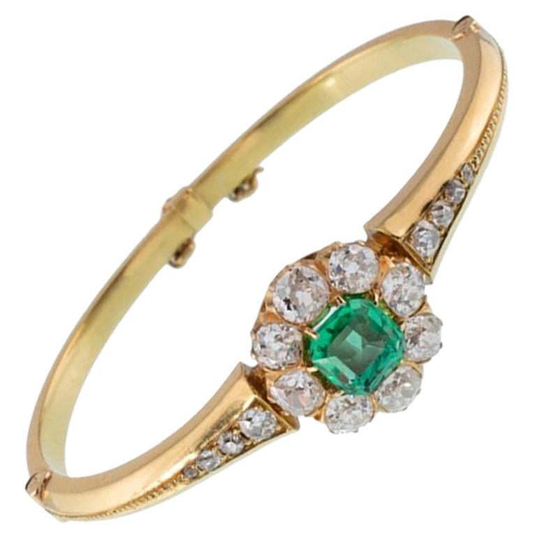 Victorian 18 Karat Gold and 2.0 Carat Emerald and 3.0 Carat Diamond Halo Bangle For Sale