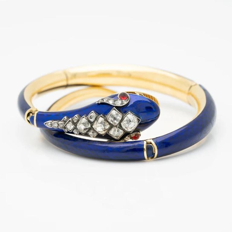 Victorian Blue Enamel and Old Mine Cut Diamond Snake Wrap Bracelet C.1880

Though it may come as a surprise to some, the snake is one of history’s most enduring symbols of eternal love. Images of Aphrodite have long depicted the goddess of love