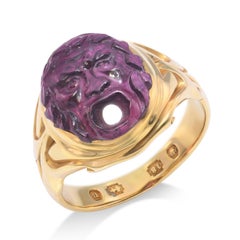 Bague victorienne en or jaune 18 carats "Bocca della Verità", grenat rhodolite sculpté