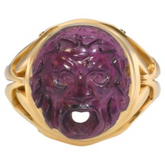 Bague victorienne en or jaune 18 carats "Bocca della Verità", grenat rhodolite sculpté