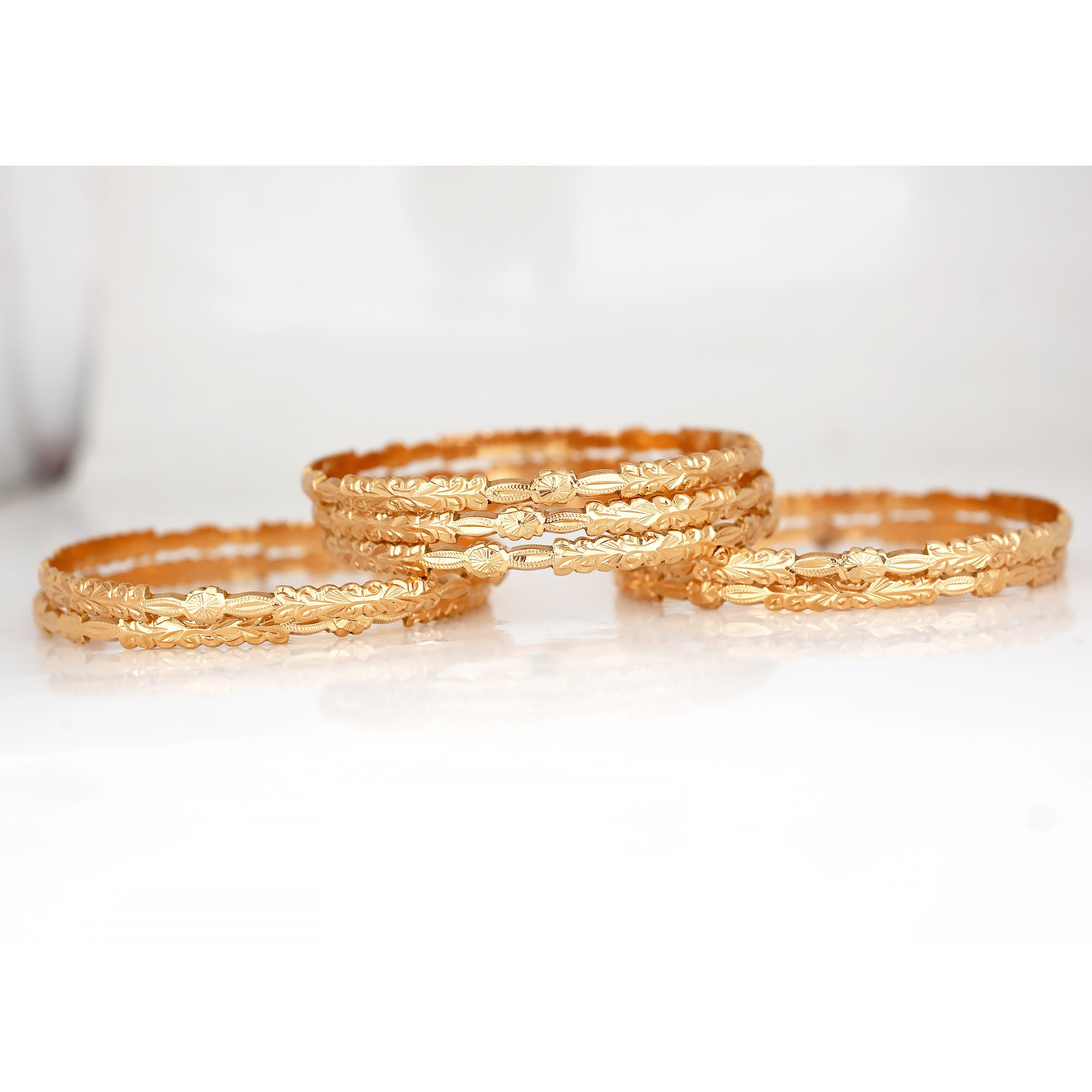 This lovely set of 7  hand engraved floral design bangle bracelets date from the Victorian period and have  beautiful look and are in great condition. The bracelets are tested at 18k Yellow Gold and 
 weigh in at 99.7 Grams. The bracelets have a